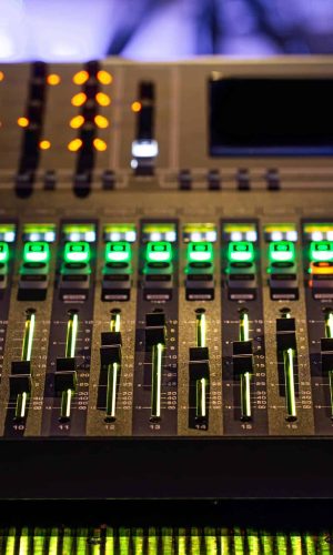 Digital mixer in a recording Studio. Work with sound. The concept of creativity and show business. Space for text.